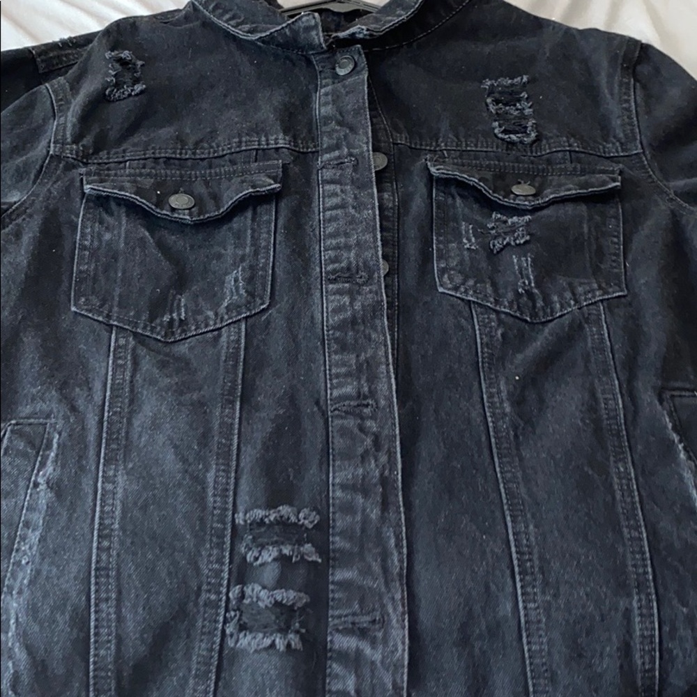 black ripped jean jacket never worn